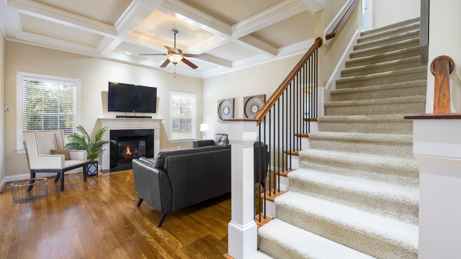 Luxury home interior showing coffered ceiling and architectural details