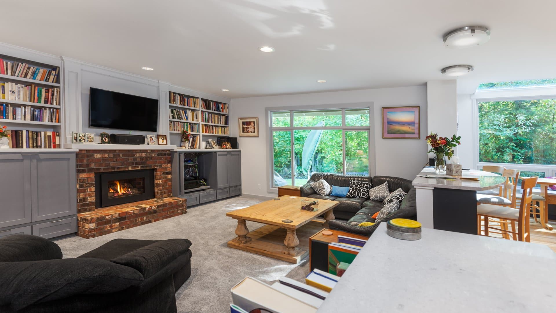 Finished attic bedroom with built-in shelving and custom finishes