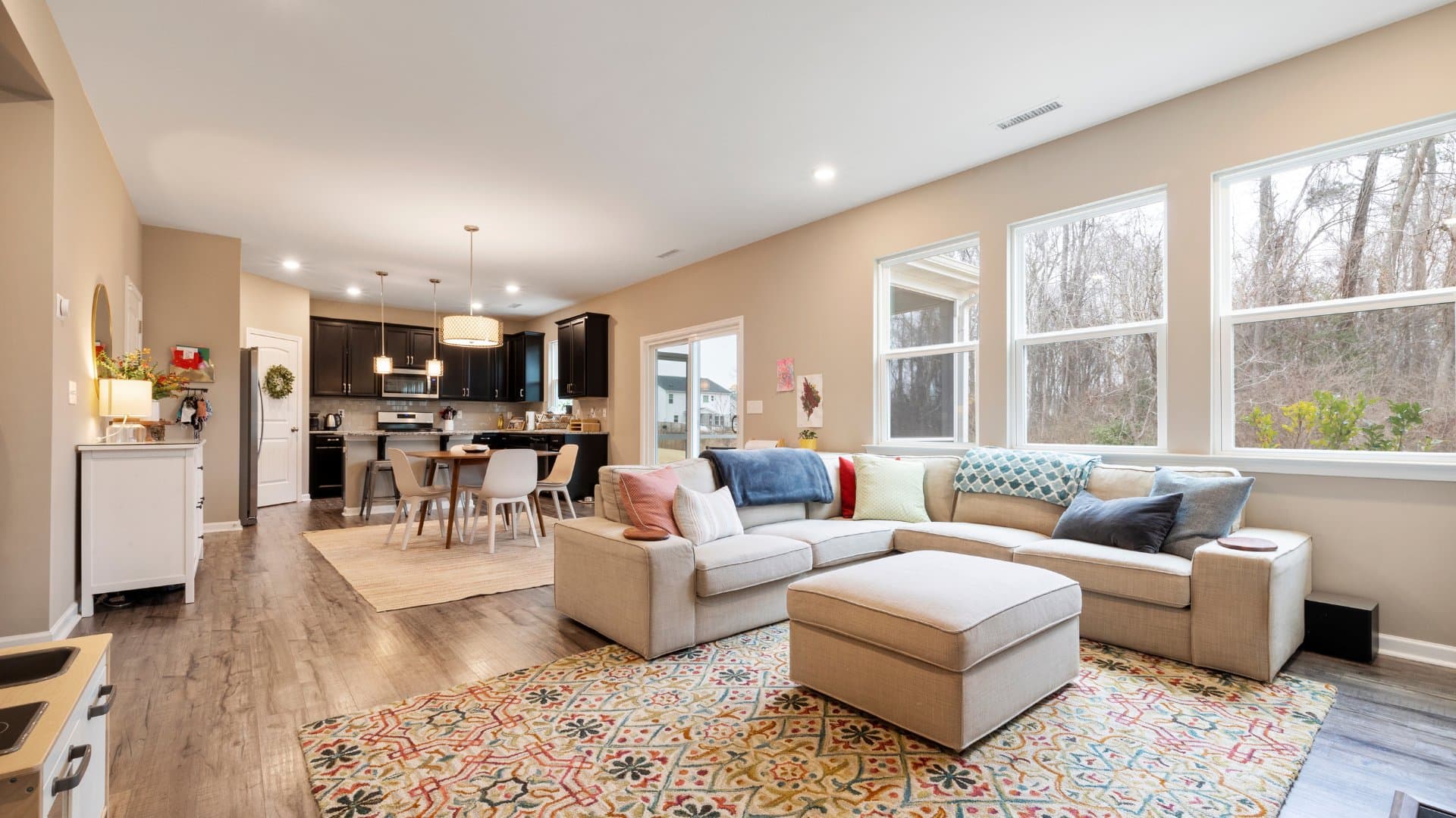 Open concept living and kitchen area in remodeled home