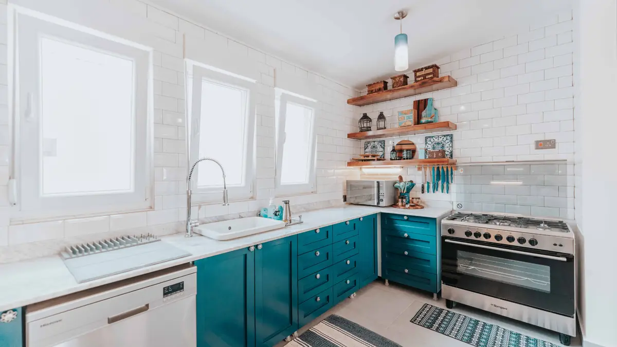 Teal kitchen cabinets