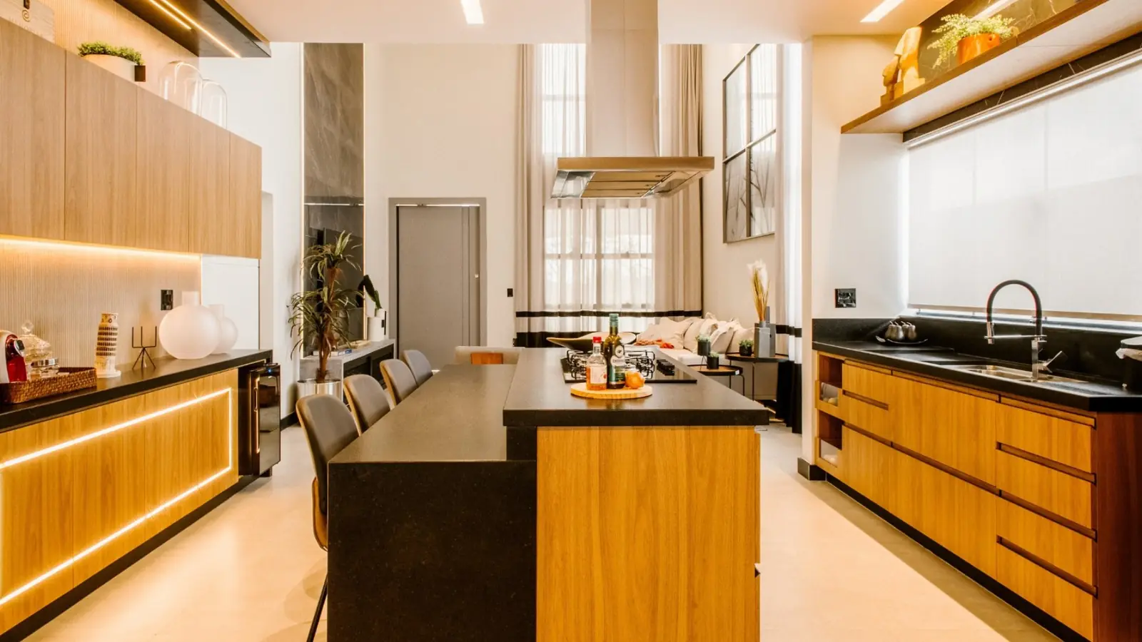 Luxury kitchen with black granite countertops and custom wood island